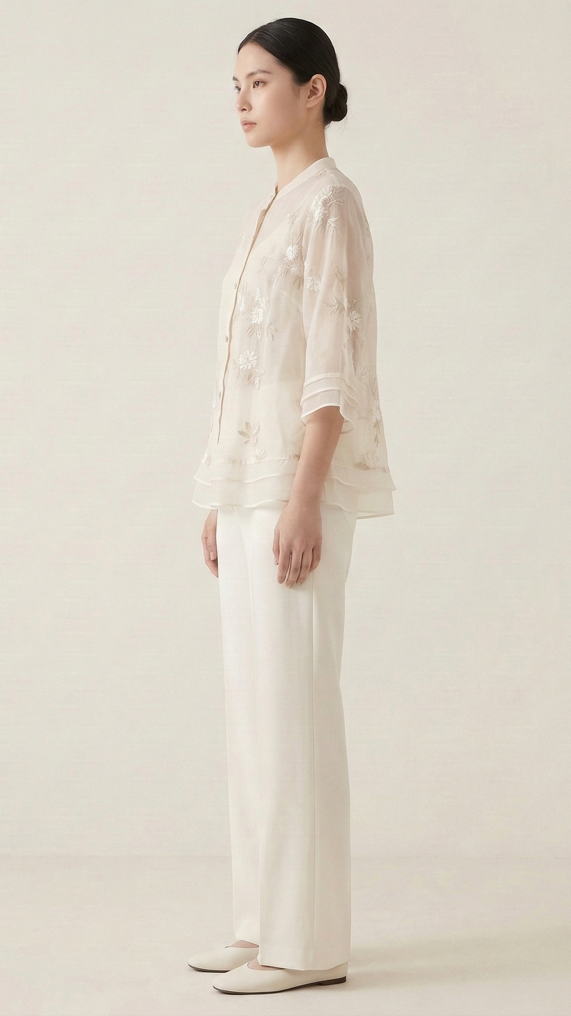 Top femme broderie florale manches longues